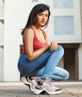 ❤️ woman, red shirt, jeans, sneakers, posing, outdoors telegram sticker