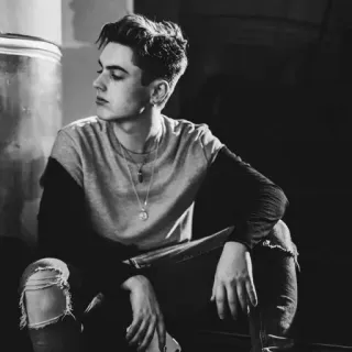 😒 person, male, young man, sitting, black and white, casual wear telegram sticker