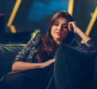 😌 woman, portrait, couch, sparkly jacket telegram sticker