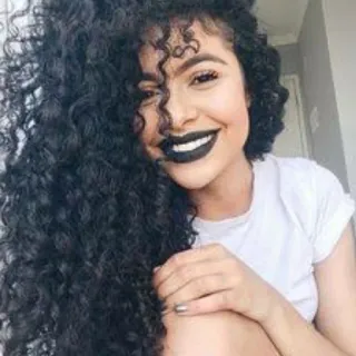 😊 woman, portrait, curly hair, smile, black lipstick telegram sticker