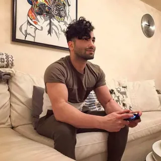 🖤 man, couch, indoors, portrait, playing video games telegram sticker