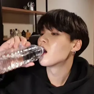🌻 person, drinking, water bottle, man, indoor, beverage telegram sticker