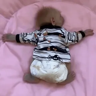 😴 baby, infant, diaper, cute, lying down, pink background whatsapp sticker
