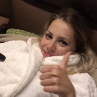 👍 woman, thumbs up, portrait, smile, indoors, robe telegram sticker