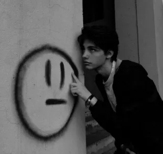 🙂 face, graffiti, young man, pointing, wall, sad telegram sticker