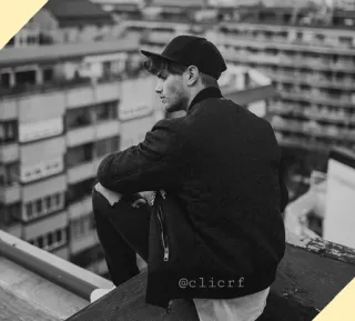 〽️ @clicrf atap, kota, pria, hitam putih, jaket, duduk whatsapp sticker