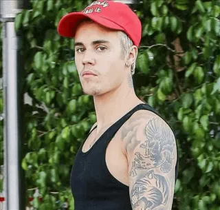 😐 Justin Bieber hardly need it 有名人, 歌手, ポートレート, 男性, 帽子, タトゥー telegram sticker