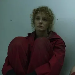 😐 Money Heist femme, cheveux bouclés, combinaison rouge, prisonnière, pleurs telegram sticker
