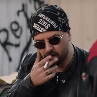 🚬 EASTERN STATE PENITENTIARY мужчина, сигарета, солнцезащитные очки, кожаная куртка, бандана, тюрьма telegram sticker