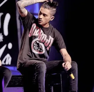 👀 DEADLOT man, sitting, stage, microphone, tattoo telegram sticker