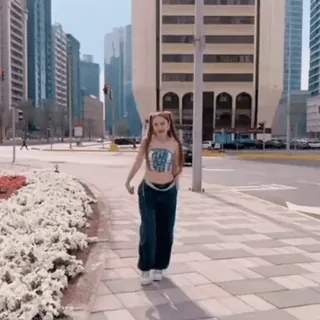 🤫 girl, walking, hand, waving, city, street, fashion, vlogger, smile telegram sticker