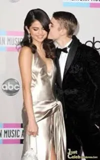 😘 Selena Gomez, Justin Bieber Selena Gomez, Justin Bieber, celebrities, kiss, red carpet, formal wear telegram sticker