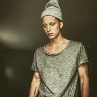 😞 ALMUSIC man, beanie, portrait, casual, indoor, gray telegram sticker