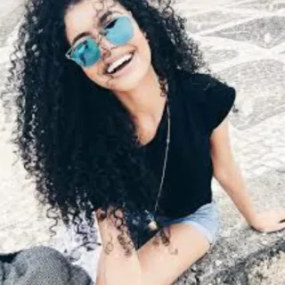 😂 woman, curly hair, sunglasses, smiling, portrait, casual, happy telegram sticker