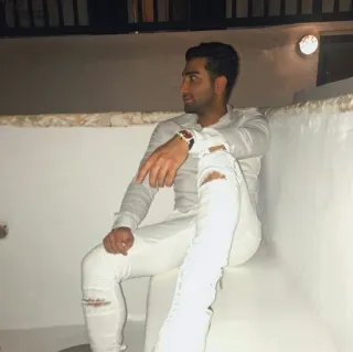 🌀 man, white jeans, ripped jeans, sitting, posing telegram sticker