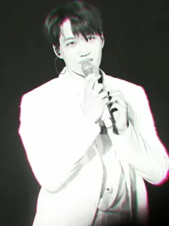 ➿ man, singer, white suit, microphone, performance, stage telegram sticker
