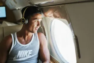7️⃣ man, headphones, window, tank top, airplane telegram sticker