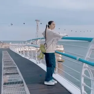 🫠 woman, scenic, bridge, ocean, fashion, lifestyle, travel, outdoors telegram sticker