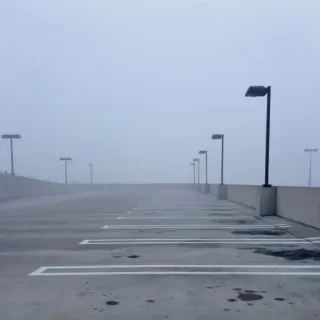 👁 parking garage, fog, empty, street lights, parking spots telegram sticker