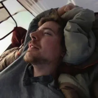 🌟 man, indoors, camping, sleeping, tent telegram sticker