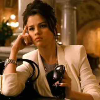 🍰 Frau, denkend, Selena Gomez, Schauspielerin, ernst, weiße Jacke telegram sticker