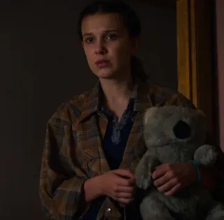 💟 Eleven Stranger Things Eleven, Stranger Things, Millie Bobby Brown, sad, teddy bear, character telegram sticker