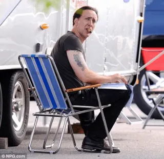 🥃 Nicolas Cage actor, celebrity, man, smoking, cigarette telegram sticker