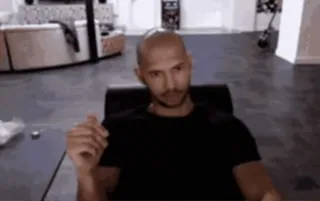 🌟 Andrew Tate influencer, man, bald, sitting, serious whatsapp sticker