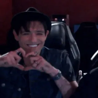 🌟 Brendon Urie Panic! At The Disco Brendon Urie, Panic! At The Disco, heart hands, smiling, musician, singer, gesture telegram sticker