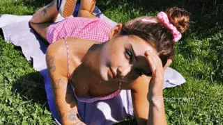 🍷 woman, grass, outdoors, lying down, portrait telegram sticker