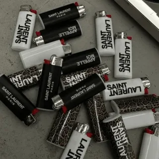 🔥 SAINT LAURENT PARIS APPELLE MOI accendini, Saint Laurent, Parigi, lusso, moda, accessori telegram sticker