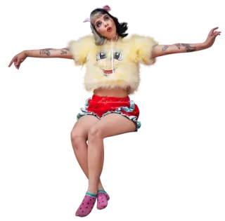 💃 Melanie Martinez Melanie Martinez, cantante, estrella pop, crocs rosas, pantalones cortos rojos telegram sticker