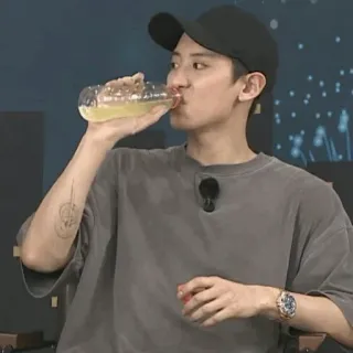 📀 man, drinking, juice, casual, indoors, cap telegram sticker