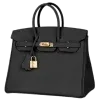 👜
