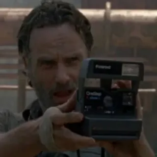 🤩 Rick Grimes The Walking Dead man, camera, walking dead, rick grimes, polaroid, person telegram sticker