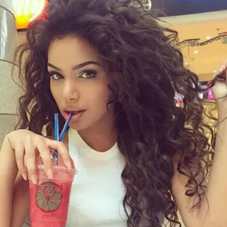 👀 woman, curly hair, smoothie, beverage, portrait, indoors telegram sticker