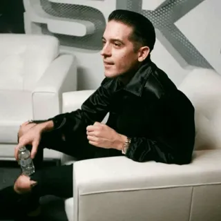 💰 man, sitting, couch, black shirt, water bottle, gerald earl gillum, g-eazy telegram sticker