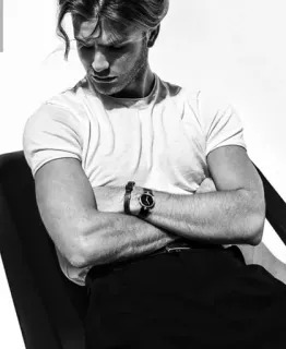 📎 man, seated, black and white, watch, arms crossed, t-shirt telegram sticker