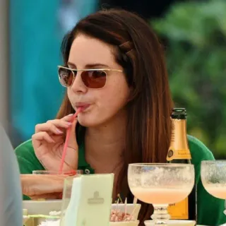 🍒 Lana Del Rey singer, sunglasses, woman, drinking, champagne telegram sticker