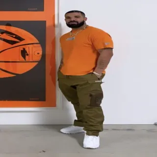 💡 Drake Drake, Musicista, Rapper, Celebrità, Camicia arancione, Pantaloni cargo telegram sticker