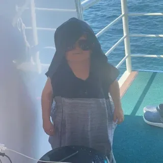😁 child, sunglasses, hoodie, sea telegram sticker