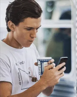 😐 4. Find 48 meters tom holland, actor, coffee, phone whatsapp sticker