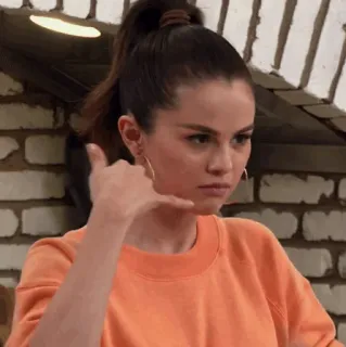 🍊 Selena Gomez selena gomez, call me, celebrity, actor, singer, orange sweater telegram sticker