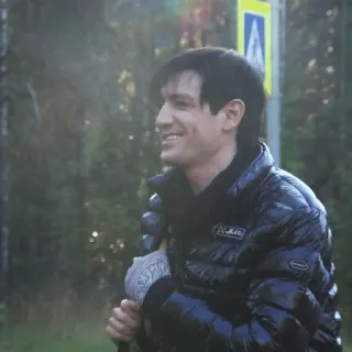 🌟 Gorchakov Mishka Yaponchik man, smiling, winter jacket, glove, forest background, portrait, puffer jacket telegram sticker