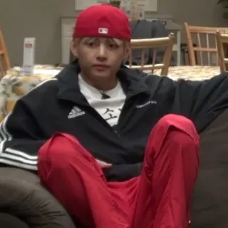 🦚 소통 person, man, red, sitting, jacket, hat telegram sticker