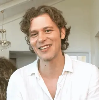 🥨 man, person, portrait, face, smile, white shirt, curly hair telegram sticker
