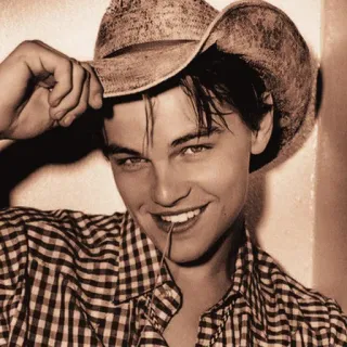 🌻 Leonardo DiCaprio Leonardo DiCaprio, actor, cowboy hat, smile, sepia, celebrity telegram sticker