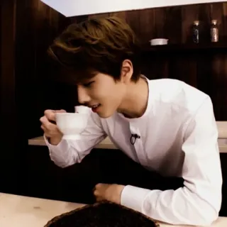 ☕ man, drinking, coffee, indoors, white shirt telegram sticker
