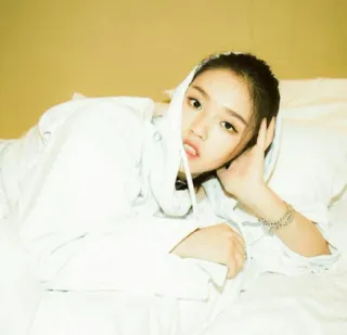 💮 woman, hoodie, portrait, indoor, young adult, lying down telegram sticker