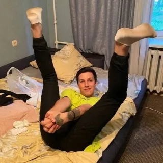 😏 man, socks, legs, bed, pose, lying down telegram sticker